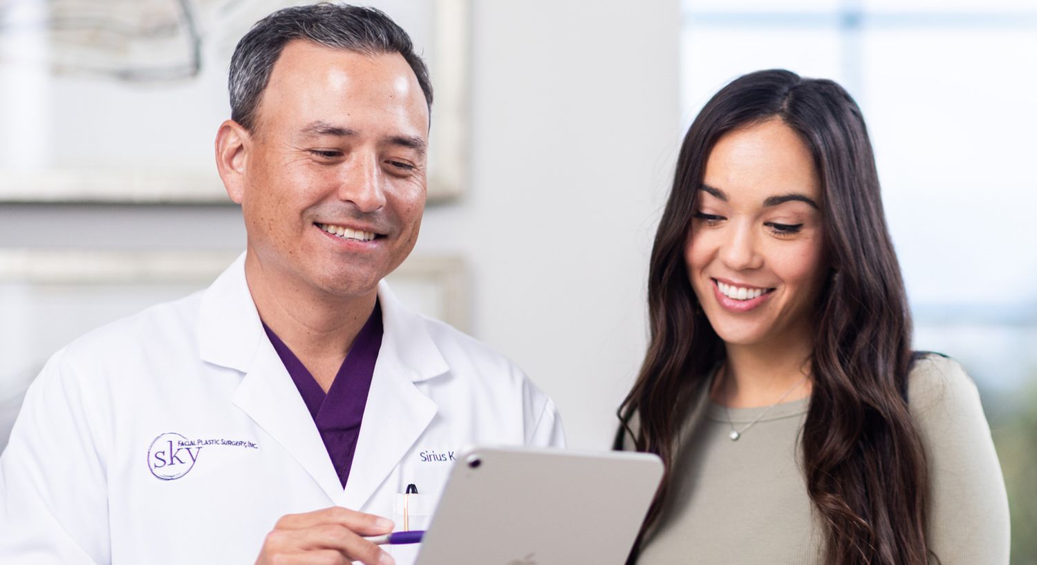 Doctor and patient discussing treatment options together.